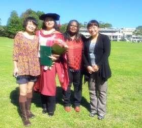Dr Hongyan Yang on her graduation day surrounded by PhD friends Grace Chang, Vera W. Tetteh and Li Jia