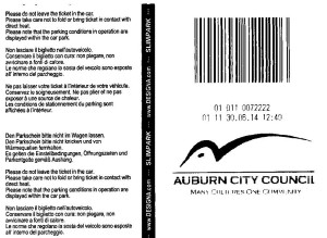 Auburn parking ticket (left: quadrilingual on back; right: city logo on front)