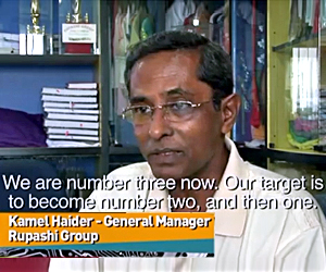 Bangladeshi manager speaking English and subtitled in British educational video “How fair is fashion”